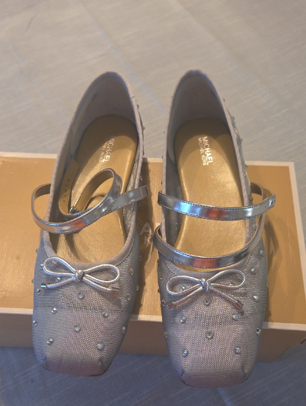 Michael Kors Metallic Silver Mary Jane Flats with Bow and Studs